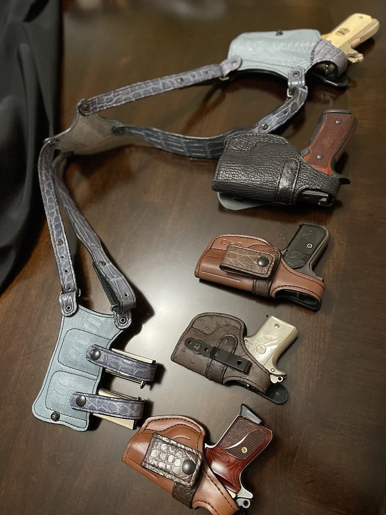 Five custom holsters made by The Southern Trapper