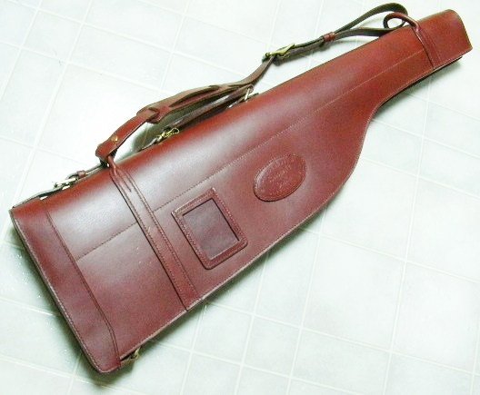 Leg-o-mutton hard-shell shotgun case