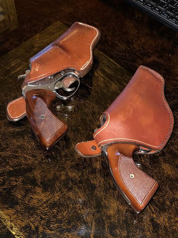 Vintage Lewis Bell Charter Oak holster with trigger guard and Bucheimer holster without trigger guard