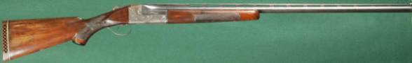 Ithaca NID single-barrel trap shotgun broken down