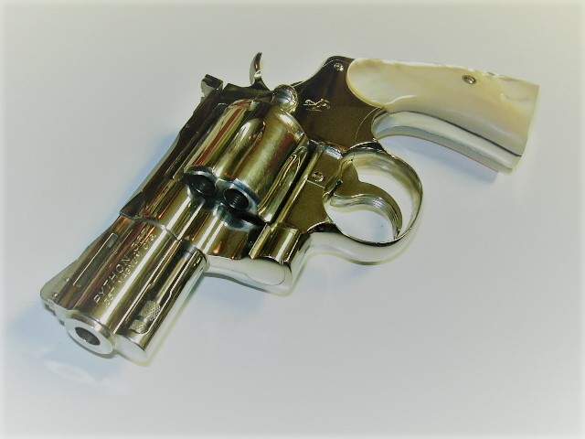 1965 Colt Python 2½-inch barrel on white background